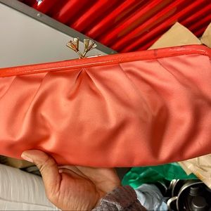 Coach frame clutch with diamond opening